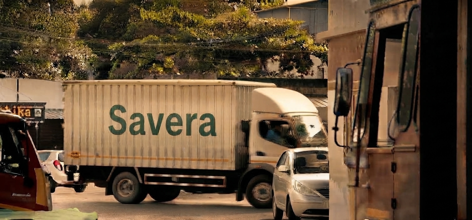 A Savera truck on the road, loaded for the port.
