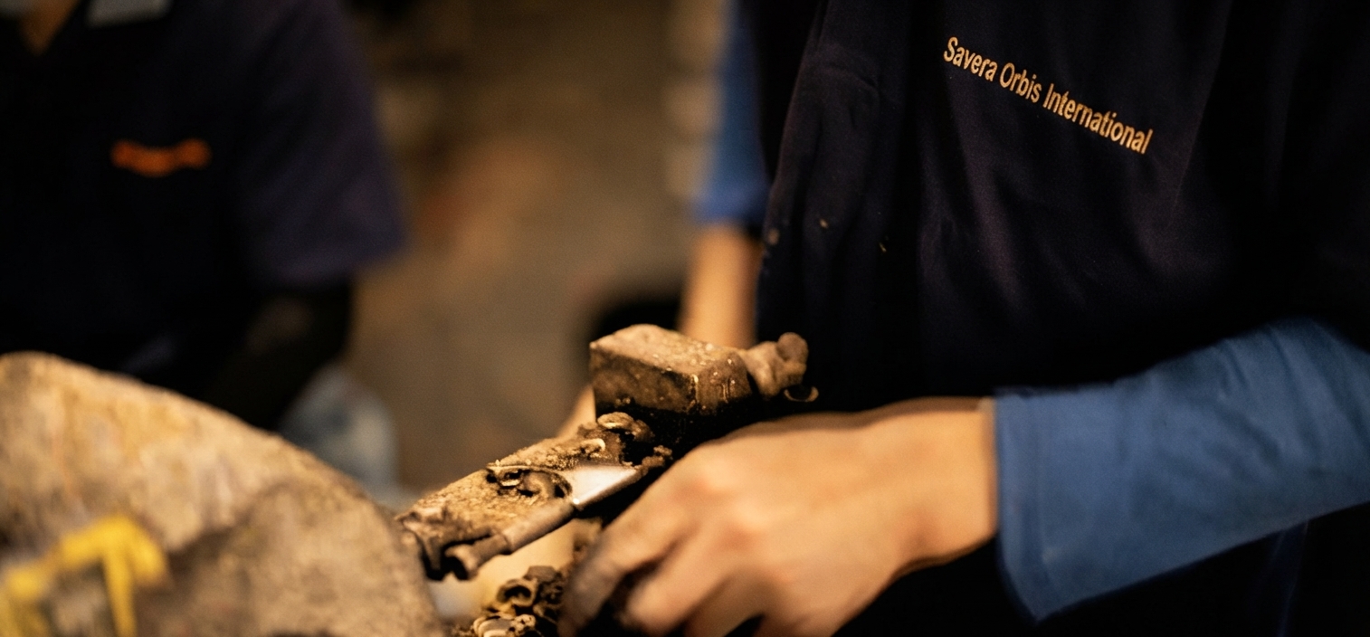 Shelling by hand.